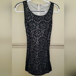 Ginger G Back Lace with Nude Lining Size M. Very Flattering.
